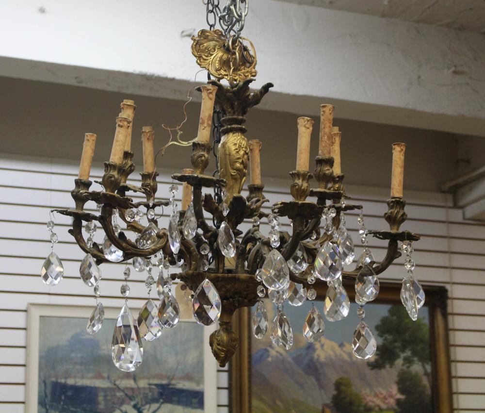 Appraisal: LOUIS XV STYLE TWELVE-LIGHT CHANDELIER gold painted bronze each candlestick