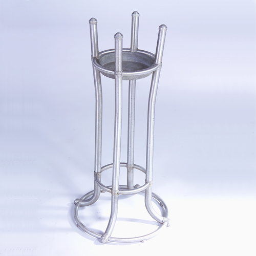 Appraisal: WARREN McARTHUR Rare tubular aluminum plant stand with integrated metal