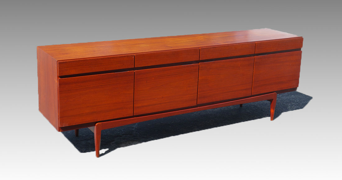 Appraisal: KOFOD LARSEN MODEL ROSEWOOD SIDEBOARD Designed by Ib Kofod-larsen for