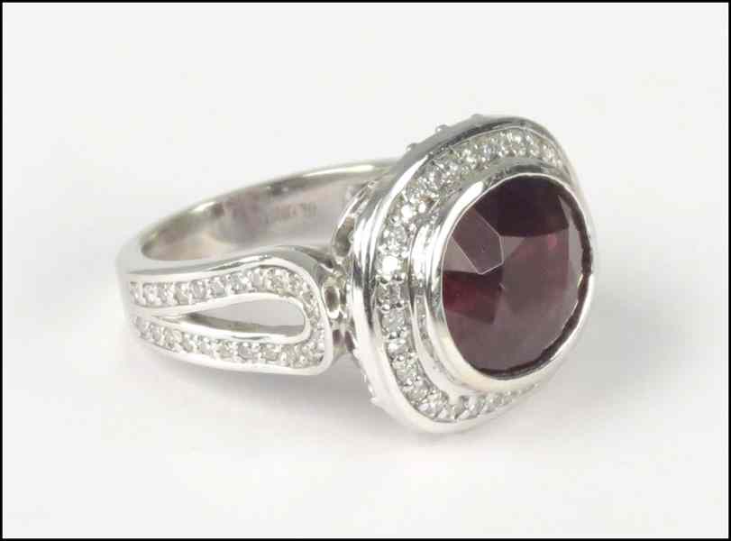 Appraisal: KARAT WHITE GOLD RHODOLITE GARNET AND DIAMOND RING Garnet is