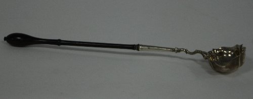 Appraisal: A Georgian silver toddy ladle David Mowden London the shaped