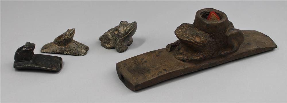 Appraisal: FOUR TOAD OR FROG FORM STONE EFFIGY PIPES th C