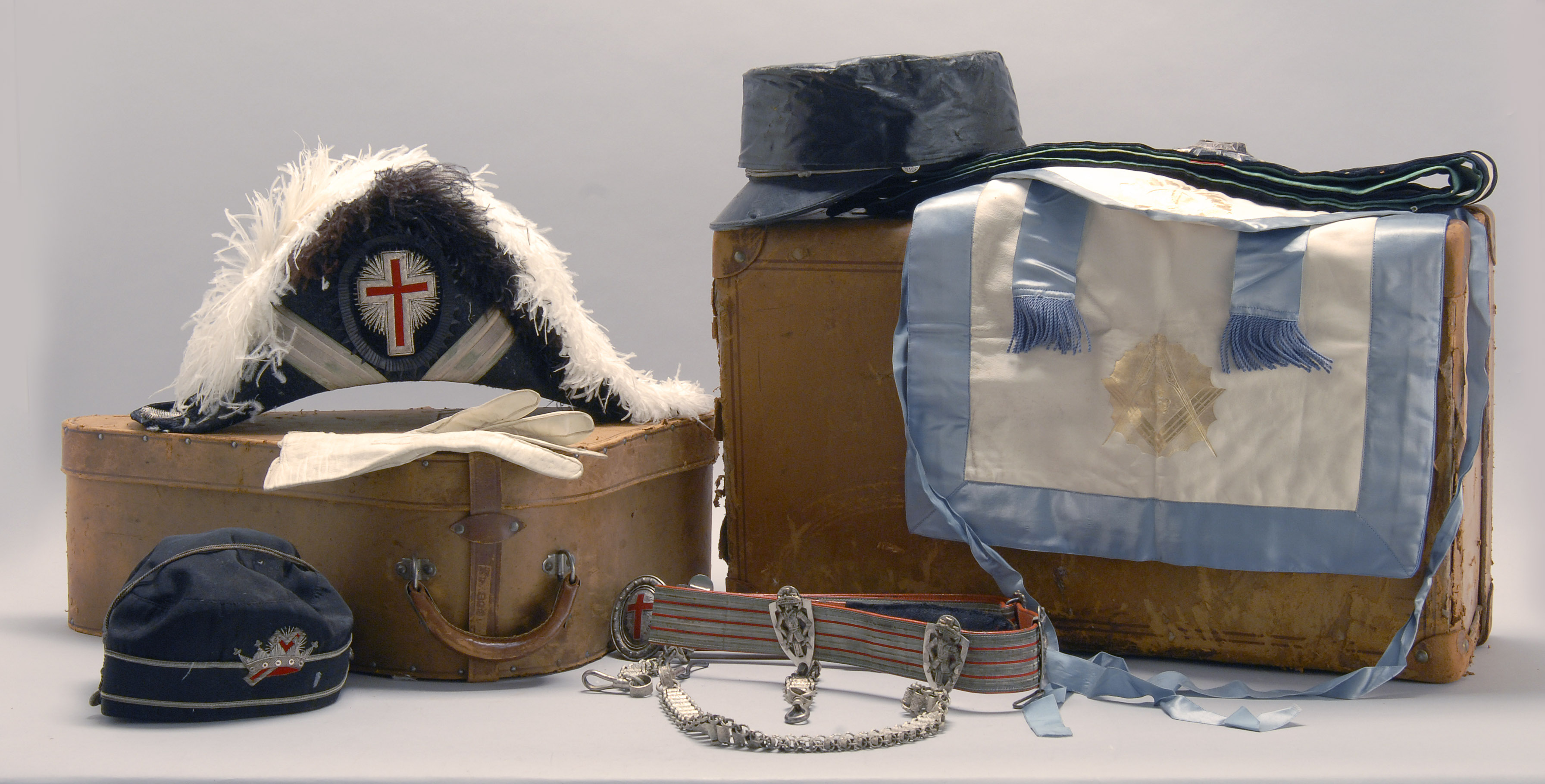 Appraisal: KNIGHTS TEMPLAR UNIFORM ACCESSORIES Contained within a leather hatbox and