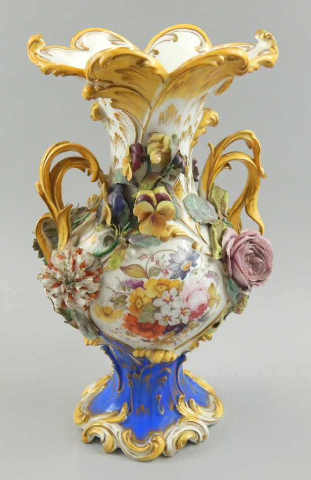 Appraisal: A thC Staffordshire porcelain two handled vase painted with flowers