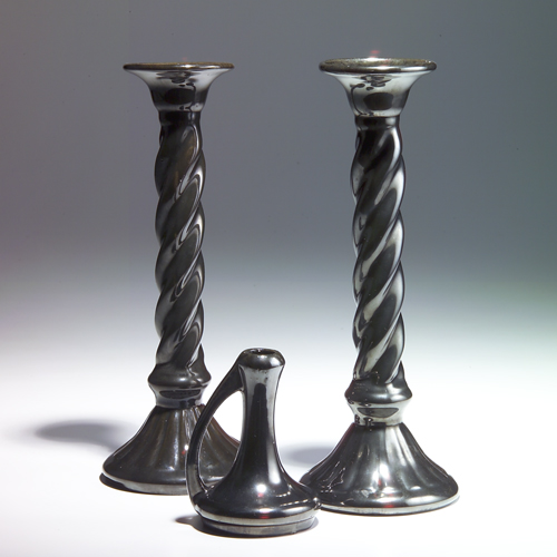 Appraisal: FULPER Three Mirror Black items a pair of twisted candlesticks