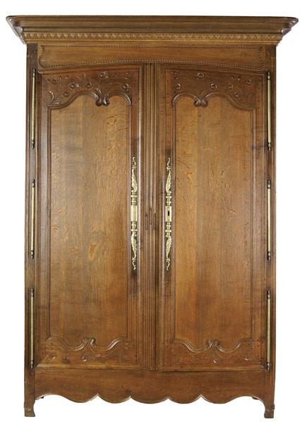 Appraisal: COUNTRY FRENCH ARMOIRE In oak with paneled double doors and