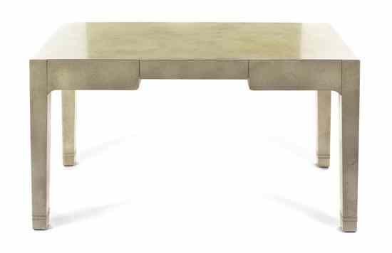 Appraisal: A Contemporary Parsons Desk having a rectangular top over the