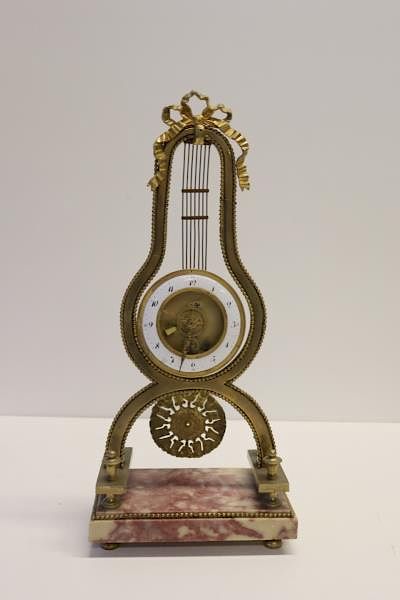 Appraisal: Deverberie a Paris Bronze And Marble Lyre Clock From a