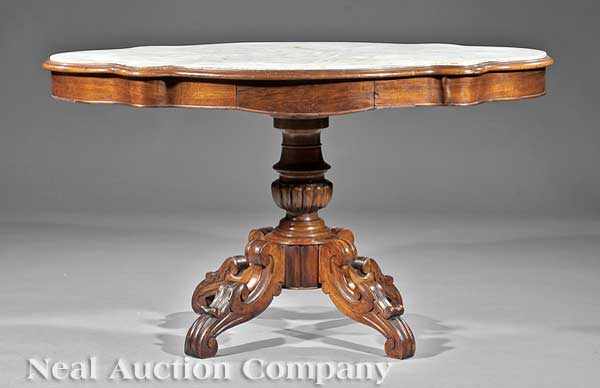 Appraisal: An Antique French Carved Walnut Center Table mid- th c