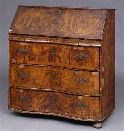 Appraisal: ITALIAN ROCOCO WALNUT-INLAID BUREAU The cross-banded flap opening to stepped