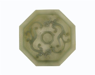 Appraisal: A Chinese jade octagonal cup stand carved with two bifid