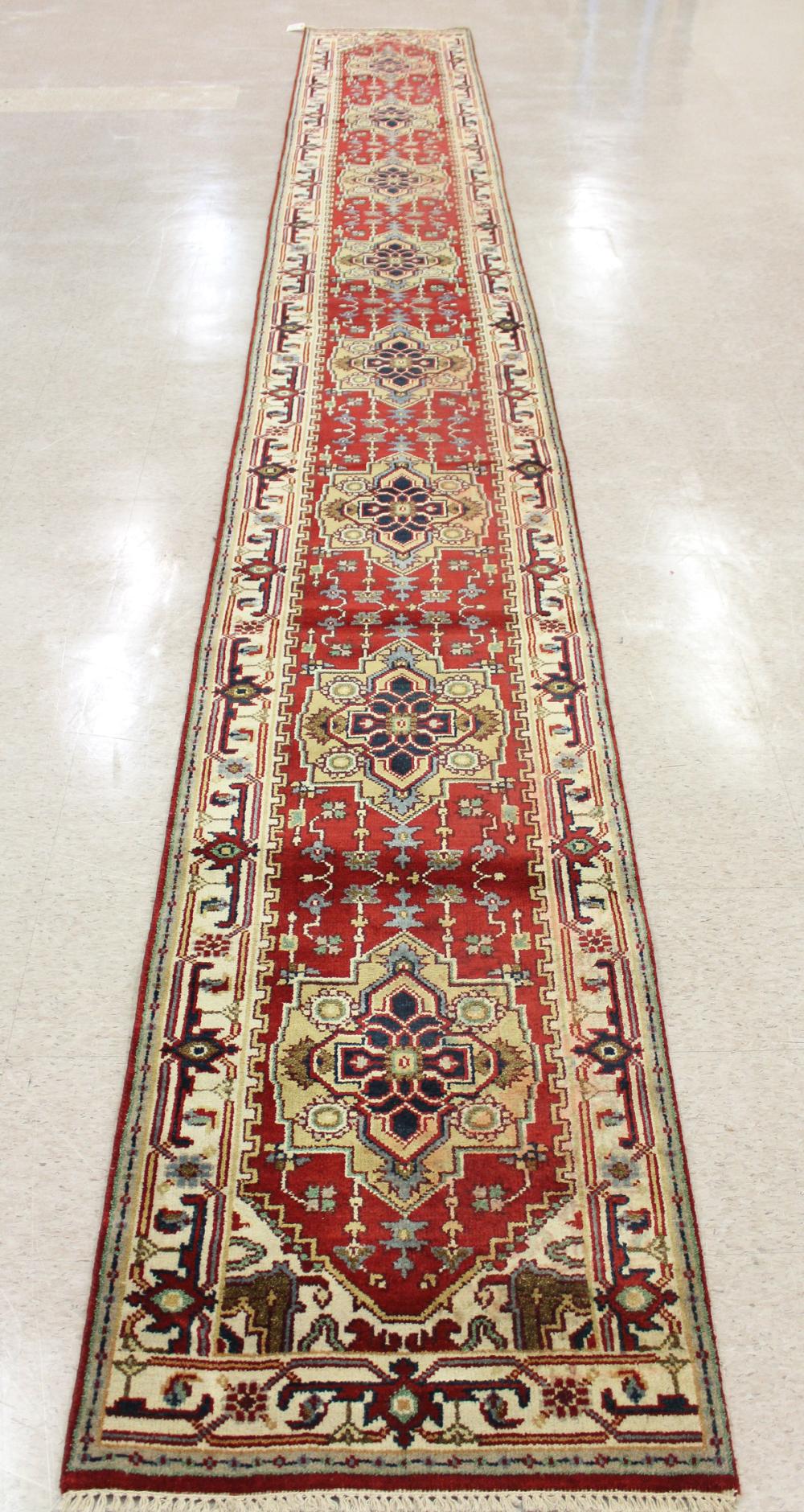 Appraisal: HAND KNOTTED ORIENTAL RUNNER Persian Serab design comprising eight medallions