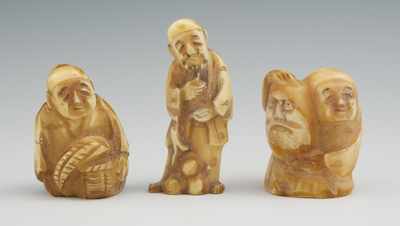 Appraisal: Three Carved Figural Netsuke Carved from animal tooth hollow forms