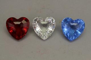 Appraisal: Swarovski Crystal Heart Shaped Paperweights Swarovski Crystal Heart Shaped Paperweights