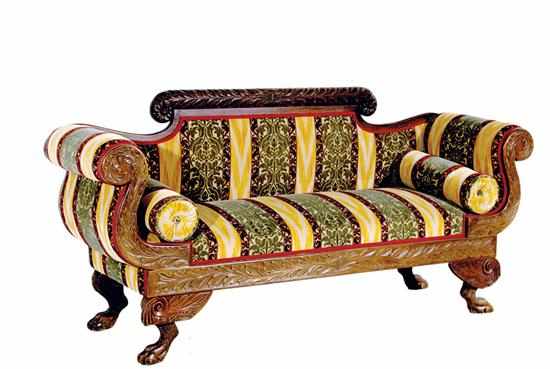 Appraisal: American Classical carved mahogany sofa circa carved crestrail above shaped