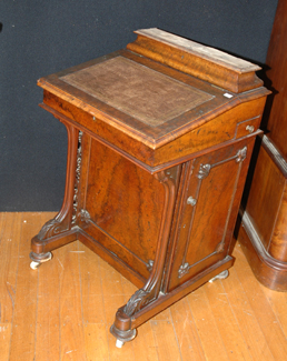 Appraisal: A VICTORIAN MAHOGANY BURR WALNUT DAVENPORT The sloped leather inset