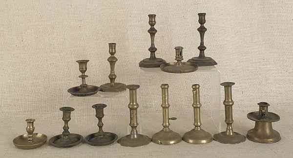 Appraisal: Collection of early brass candlesticks to include a Spanish Capstan