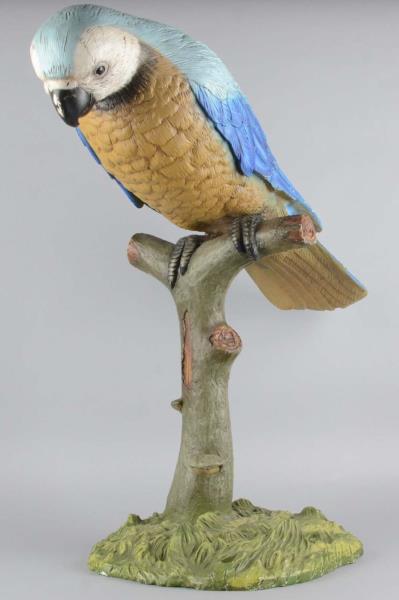 Appraisal: Tall Parrot On Branch Perch Statue This is a colorful