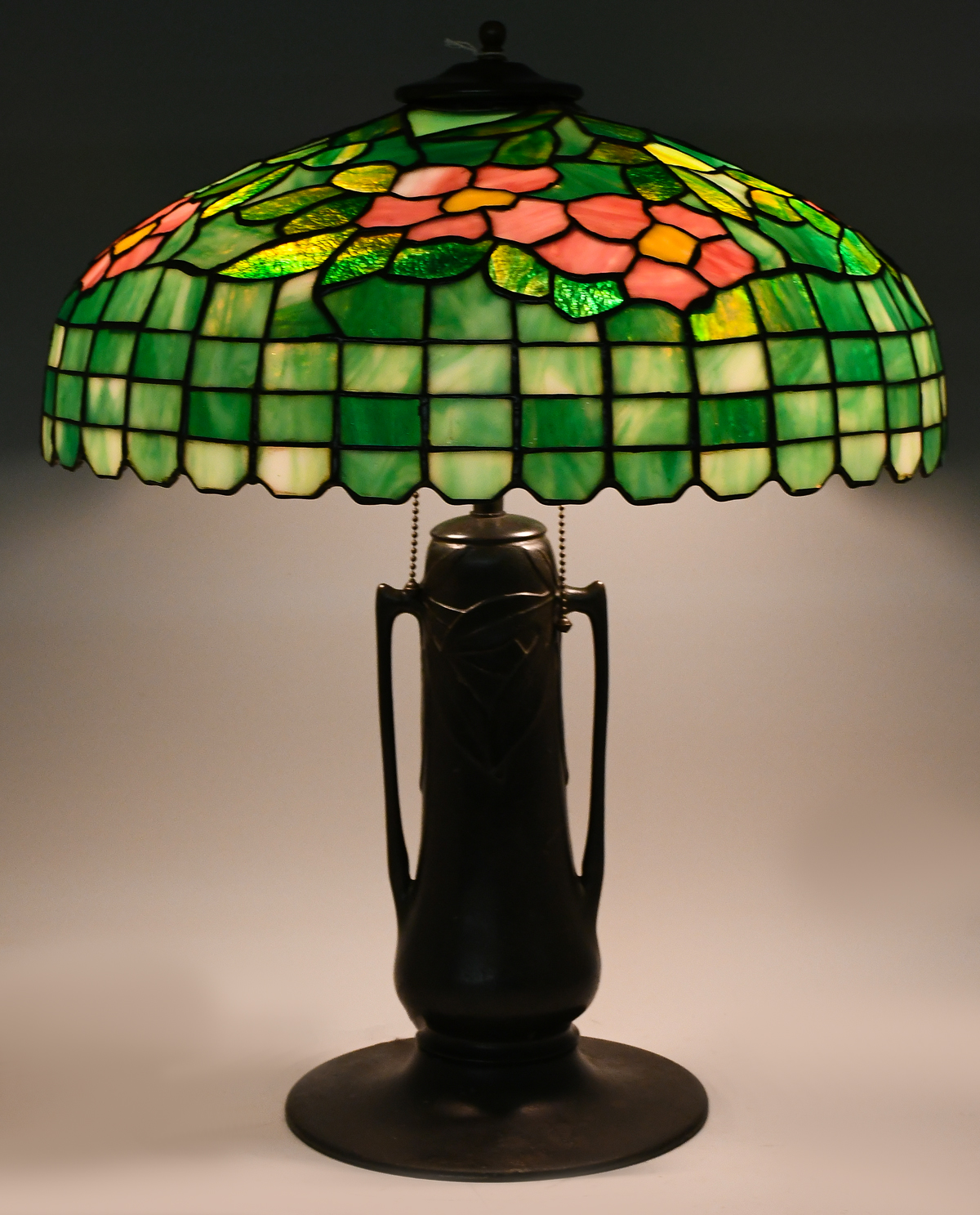 Appraisal: HANDEL LEADED GLASS FLORAL TABLE LAMP Stained glass shade having