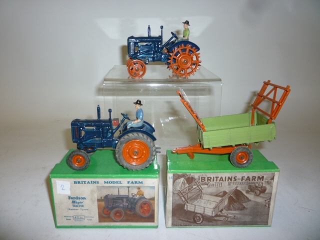 Appraisal: Three Britains Models F Fordson Major Tractor boxed G F