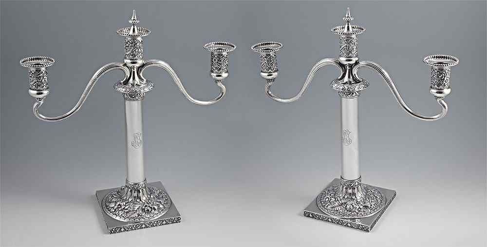 Appraisal: TIFFANY CO STERLING LIGHT CANDELABRA Floral repousse holders collar base