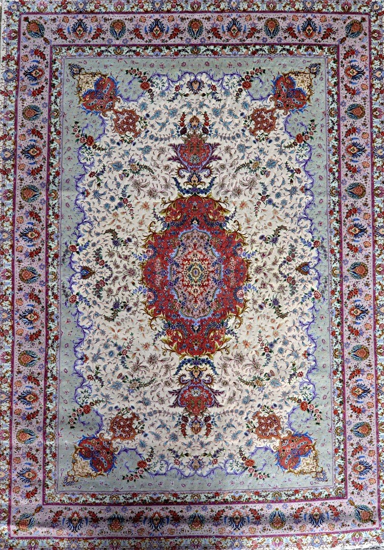 Appraisal: A part silk Kerman carpet Persian the cream field with