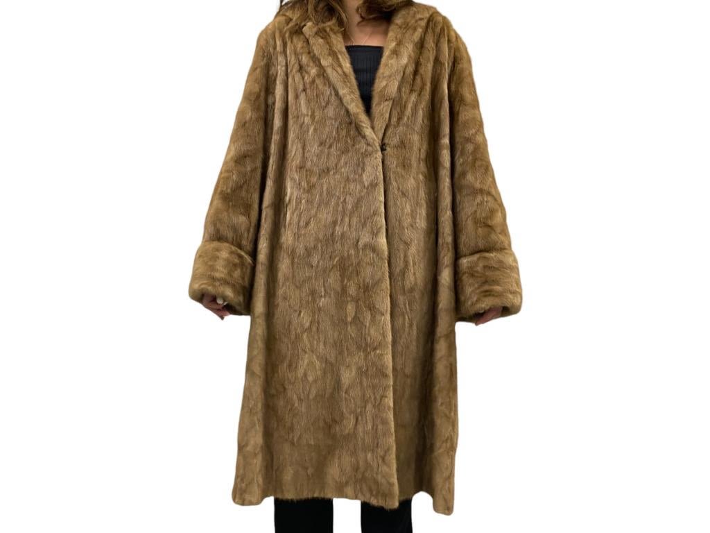 Appraisal: Woman's Fur CoatModel Height ' Length of jacket Jacket is