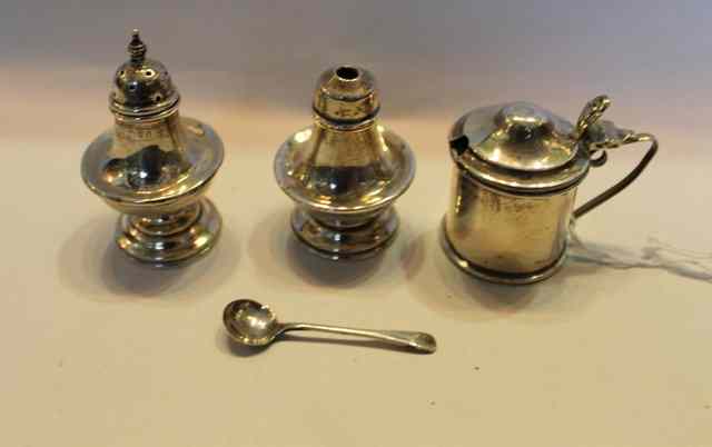 Appraisal: A SILVER SALT AND PEPPER POT of baluster form on