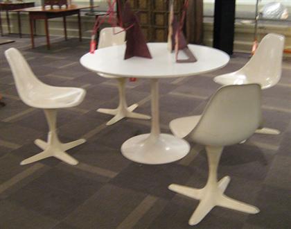 Appraisal: White tulip style dining table and chairs By Burke Mfg