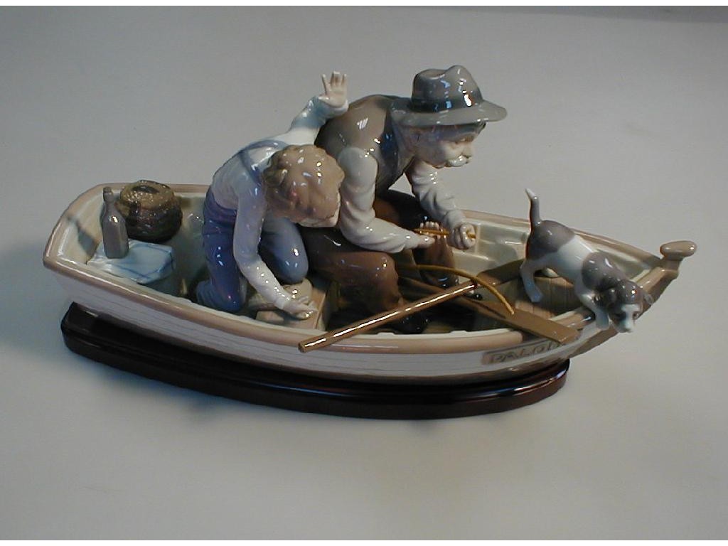 Appraisal: A Lladro Fishing Boat entitled Palona broken plastic fishing rod