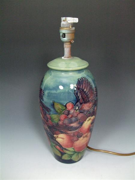 Appraisal: MOORCROFT LAMP BASE CIRCA glazed earthenware decorated in the 'Finches'