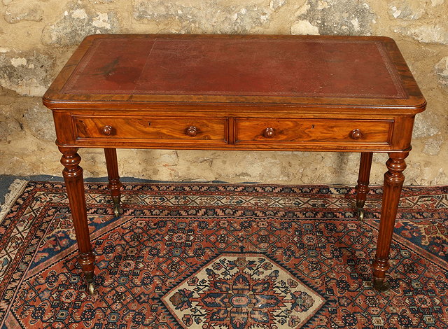 Appraisal: A GEORGE IV WALNUT WRITING DESK by C Trollope Sons