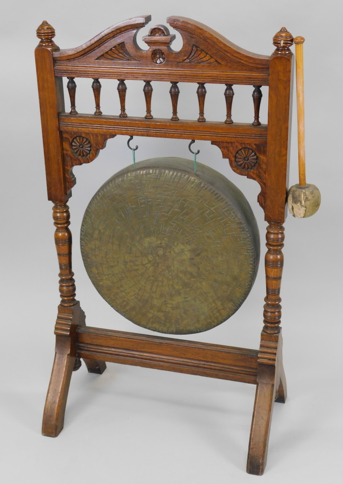 Appraisal: A late Victorian oak dinner gong with a pierced swan