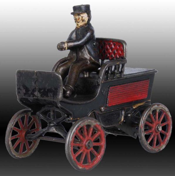 Appraisal: Cast Iron Harris Clockwork Runabout Toy Description Black with red