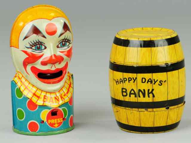 Appraisal: TWO CHEIN STILL BANKS Both lithographed tin includes classic ''Happy