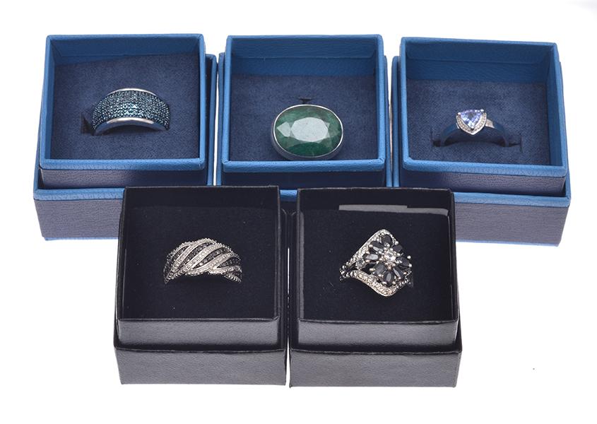 Appraisal: FIVE SILVER STONE SET RINGS BOXED FIVE SILVER STONE SET