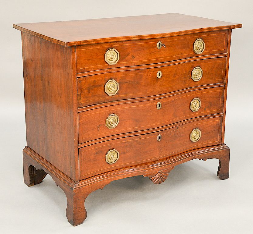 Appraisal: Mahogany serpentine front Chippendale chest having serpentine overhanging top over