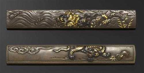 Appraisal: TWO KOZUKA Japan th century L cm a Shibuichi decorated