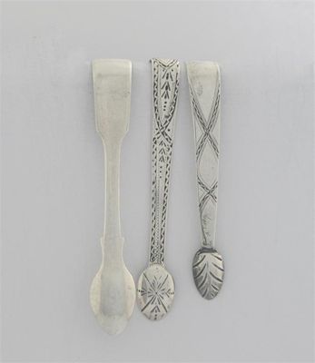 Appraisal: Three small pairs of sugar tongs a George III bright-cut