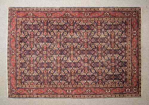 Appraisal: A Hamadan carpet woven in colours with endless ''Herati'' repeat