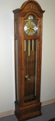 Appraisal: Ridgeway Grandmother clock oak case with brass weights rod chime