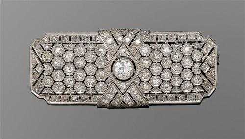 Appraisal: DIAMOND BROOCH ca Platinum Very fancy shield-shaped finely geometrically open-worked