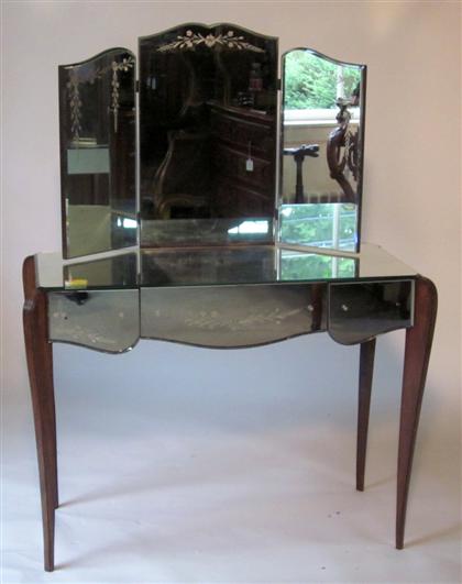 Appraisal: French art deco mirrored and mahogany dressing table The three