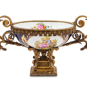 Appraisal: A Large S vres Style Gilt Metal Mounted Porcelain Centerpiece