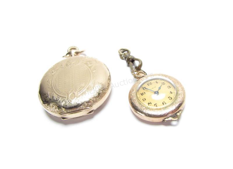 Appraisal: including a bracelet or keychain open face Elgin pocket watch