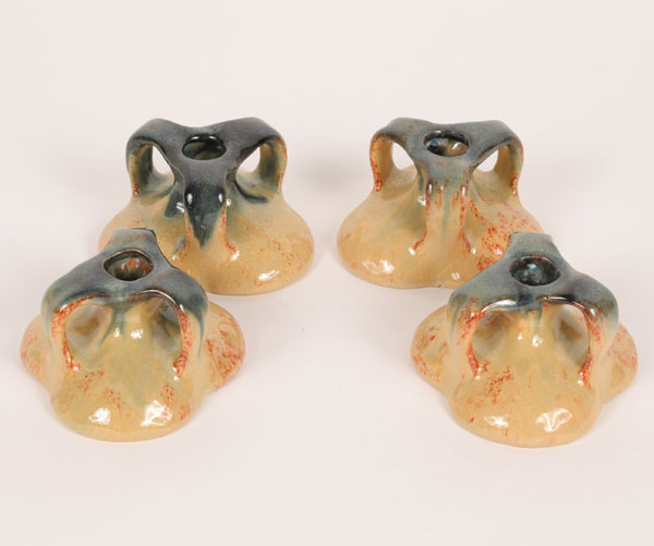 Appraisal: Muncie Art Pottery set of matching candleholders from the Spanish