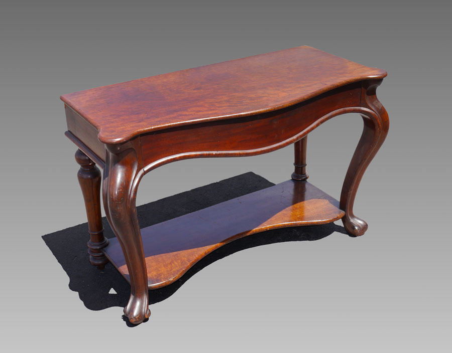 Appraisal: EARLY 'S WALNUT CONSOLE TABLE Shaped top molded apron paw