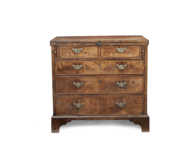 Appraisal: A George II walnut mahogany and featherbanded bachelor's chest the