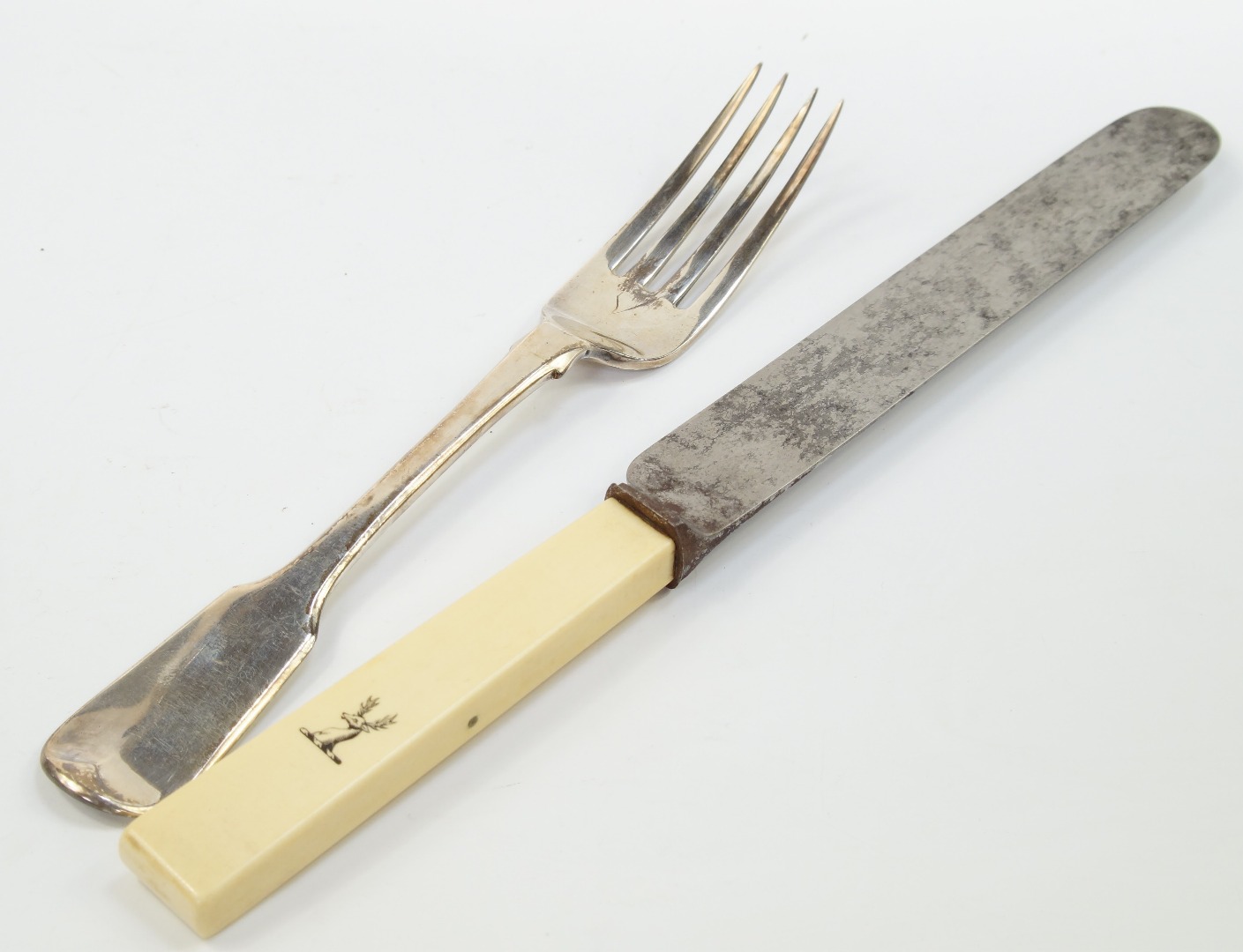 Appraisal: A Victorian silver fork and steel and ivory handled knife