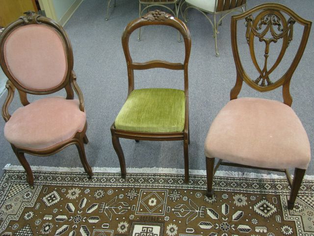 Appraisal: Three antique side chairs including walnut chair with grape and